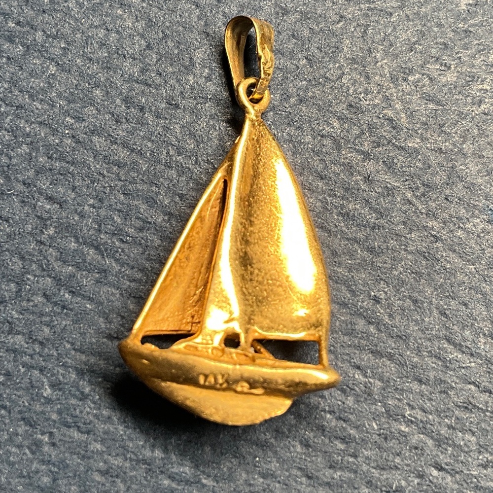 14K gold Sailboat pendant approximately 1 inch tall